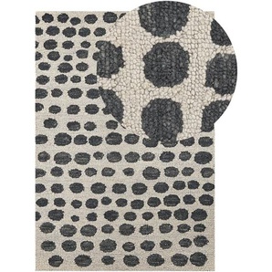 Beliani - Teppich Beige u. Schwarz Wolle Rechteckig 140 x 200 cm mit Punkte Muster Boho Skandinavisch für Wohn- und Schlafzimmer