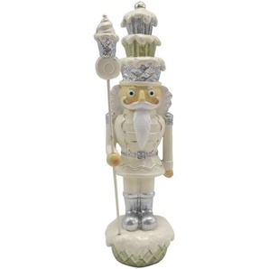 Clayre & Eef Figur Nussknacker 16 cm Beige Silberfarbig Polyresin Weihnachtsdekoration