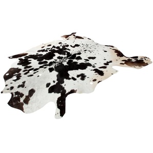 Fellteppich KAYOOM Glam 210 Lederteppich Teppiche Gr. B/L: 90 cm x 160 cm, 3 mm, 1 St., schwarz-weiß (schwarz, weiß) Esszimmerteppiche 100% Rindsleder, Unikat, naturbelassene Farbakzente