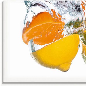 Glasbild ARTLAND Zitrusfrüchte fallen in klares Wasser Bilder Gr. B/H: 125 cm x 50 cm, Lebensmittel, 1 St., bunt Glasbilder