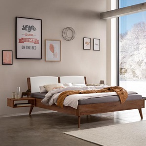 Hasena Massivholzbett, Kopfteil gepolstert Fabro, Farbe: Nussbaum, geölt, Bezugsfarbe: Kul white, verschiedene Größen