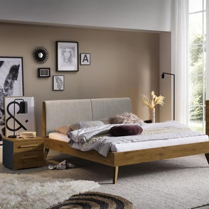 Hasena Massivholzbett, Kopfteil gepolstert Simone, Farbe: Wildeiche natur, geölt, Bezugsfarbe: Pepe grey, verschiedene Größen