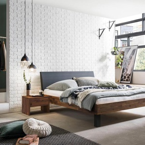 Hasena Massivholzbett, Kopfteil gepolstert Sondrio, Farbe: Nussbaum, geölt, Bezugsfarbe: Kul black, Metallfarbe: Anthracit, verschiedene Größen