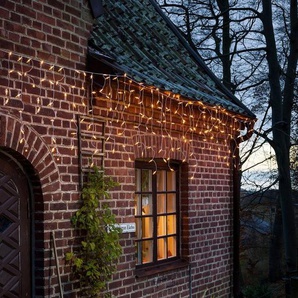 KONSTSMIDE LED-Lichtervorhang Weihnachtsdeko aussen, 200-flammig, LED Eisregen Lichtervorhang, 200 bernsteinfarbene Dioden