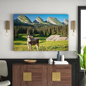 Leinwandbild Schweizer Alpenwiese mit Kuh
