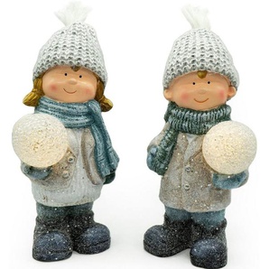 NOOR LIVING Dekolicht Winterkinder aus Keramik im 2er Set, mit Beleuchtung, Höhe ca. 26 cm, LED fest integriert, Weihnachtsdeko, Batteriebetrieben, Dekofigur mit LED Ball