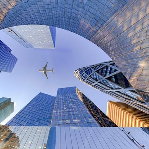 Papermoon Fototapete Flugzeug über Stadt