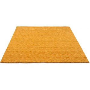 Wollteppich THEKO Holi Teppiche Gr. B/L: 140 cm x 200 cm, 13 mm, 1 St., goldfarben Esszimmerteppiche Uni-Farben, leicht meliert, reine Wolle, handgewebt mit Knüpfoptik